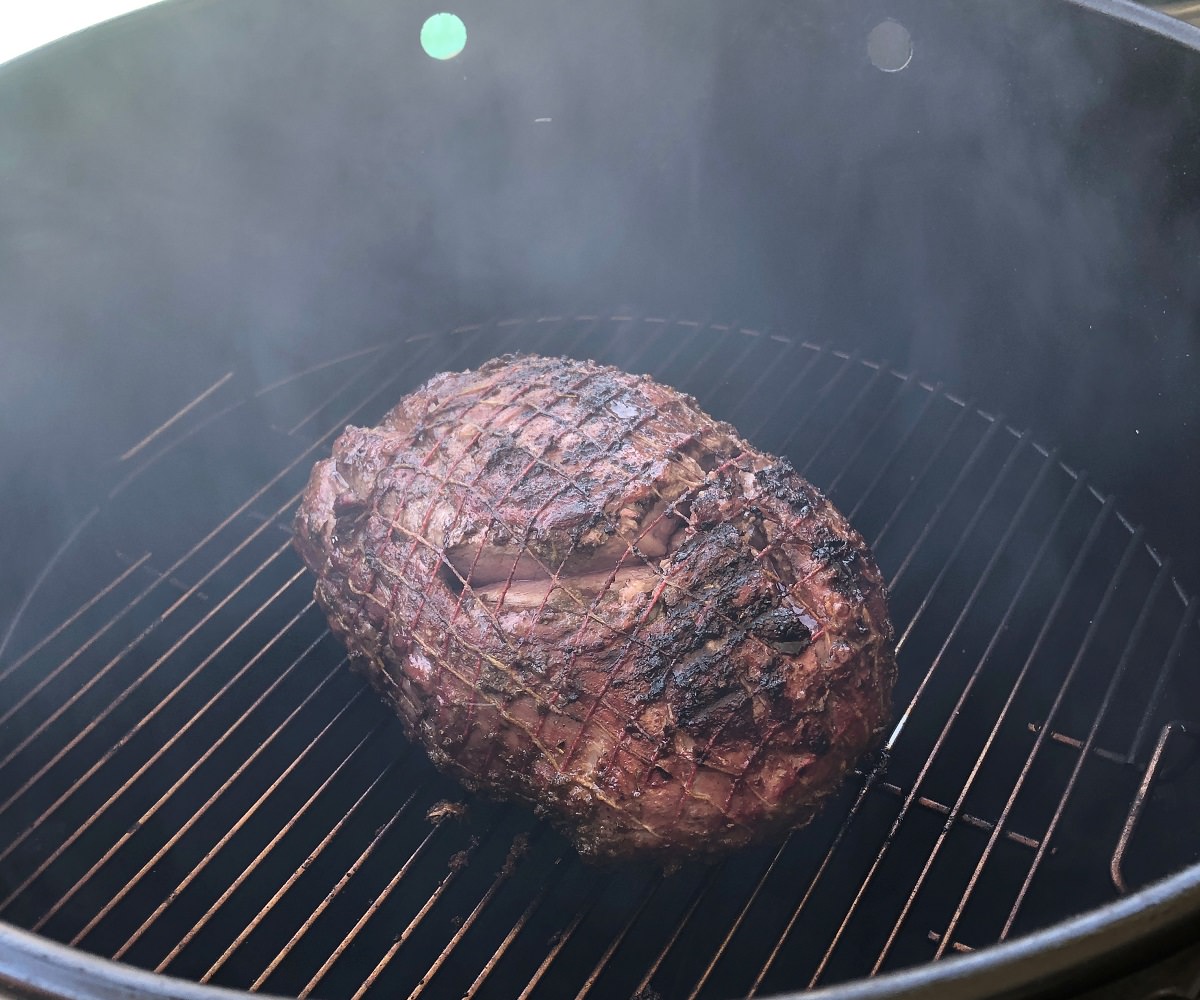 Cook lamb on grill