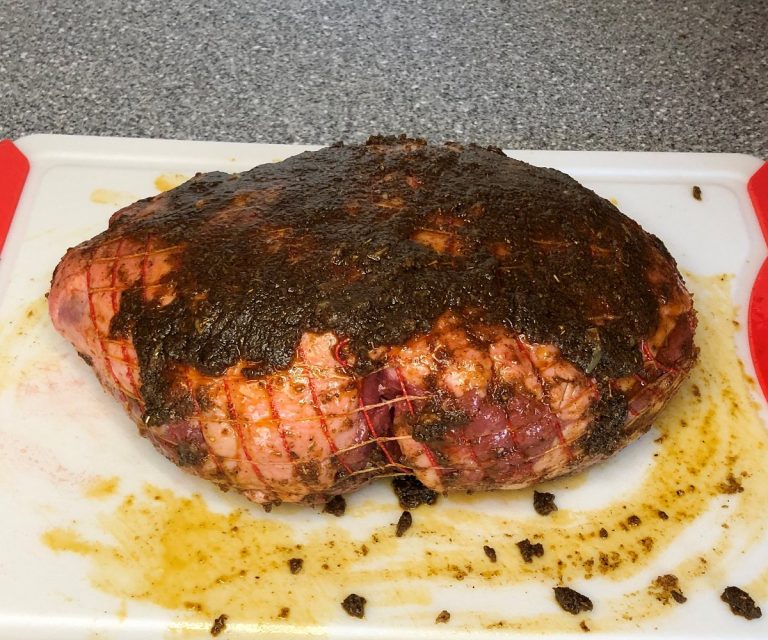 Spread the paste evenly on lamb