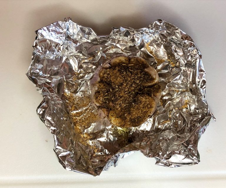 Make a little foil cup to hold the garlic
