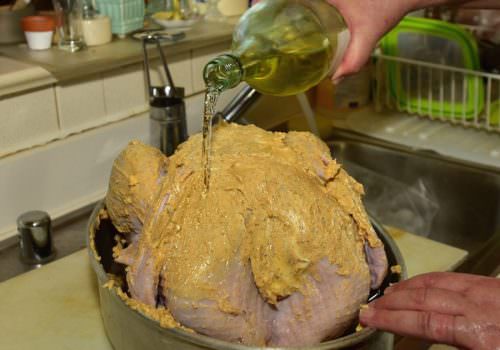 Pour wine all over the bird and in the cavity
