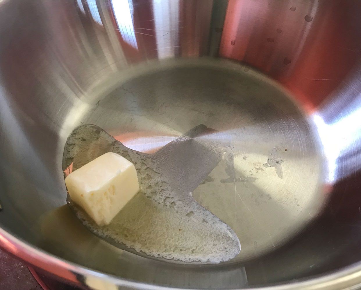 Melt the butter in a sauce pan over medium heat