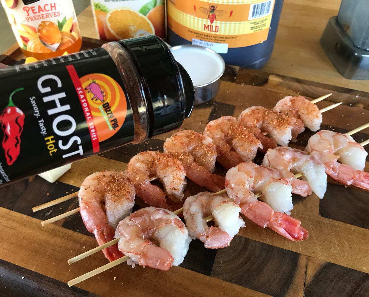 Thread the shrimp onto double skewers for ease of handling. Season shrimp with a coating of Dizzy Pig Ghost seasoning
