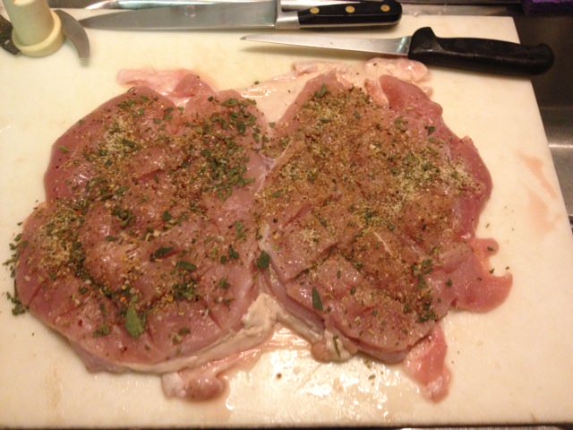 Rub the scored breasts with the herb and Raising the Steaks mixture