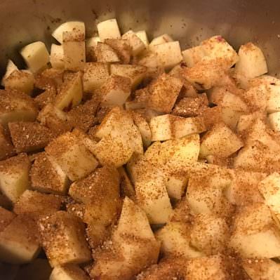 Brown potatoes in pan. Season with a little more Molé while in pan