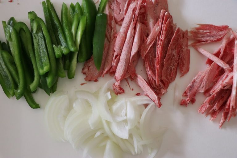 Chop onion and pepper into thin slices