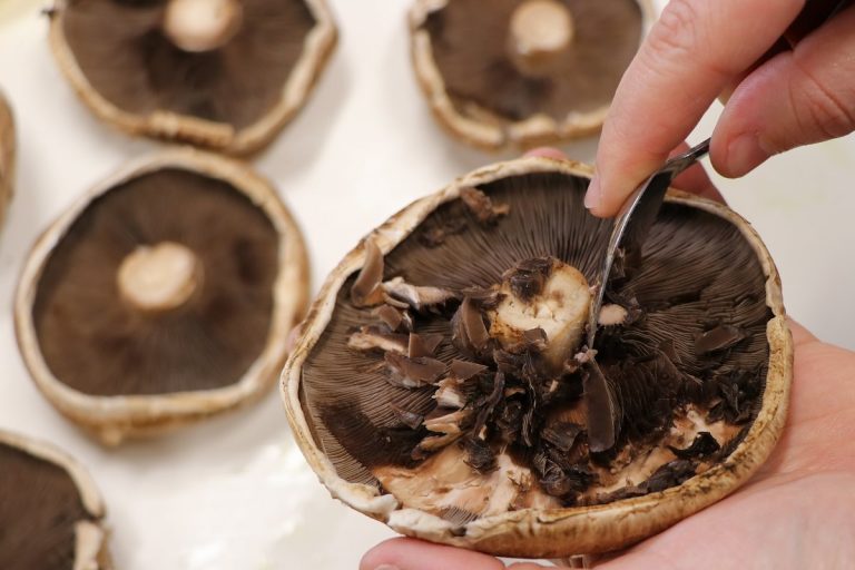 Scoop out the gills from mushrooms