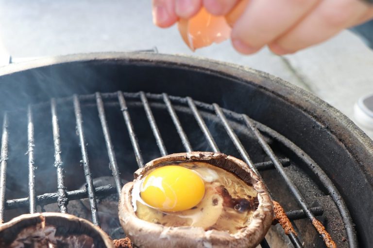 Crack an egg onto each mushroom cap