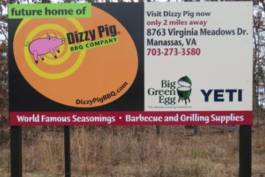 New Dizzy Pig building sign