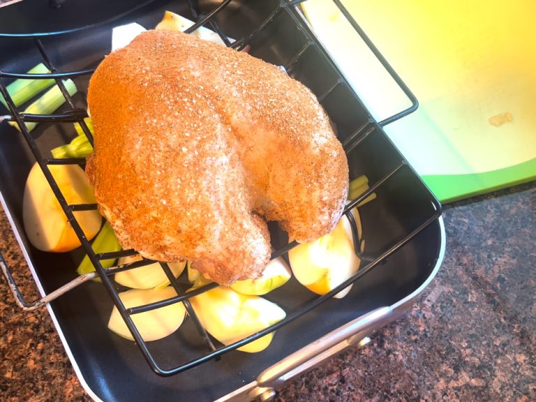 Place chicken breast on roasting pan rack