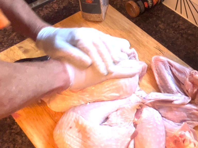 Flatten breast by pressing with the palm of your hand