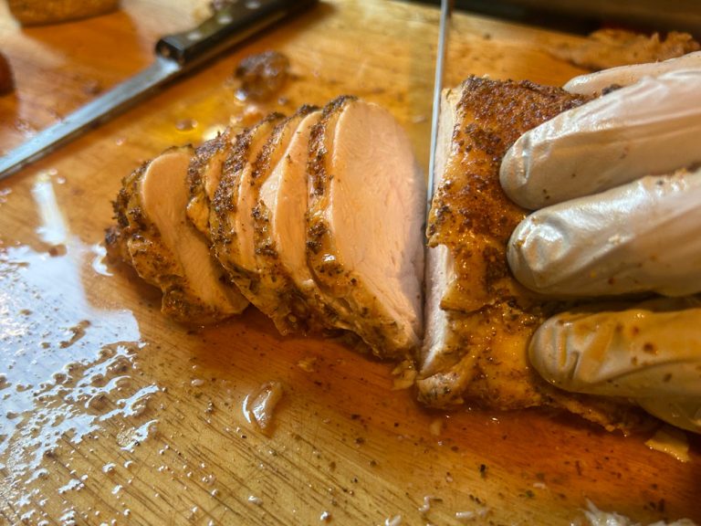 Slice breast so that each slice has a piece of skin