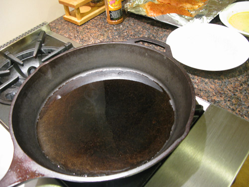 Preheat oil in pan until just smoking
