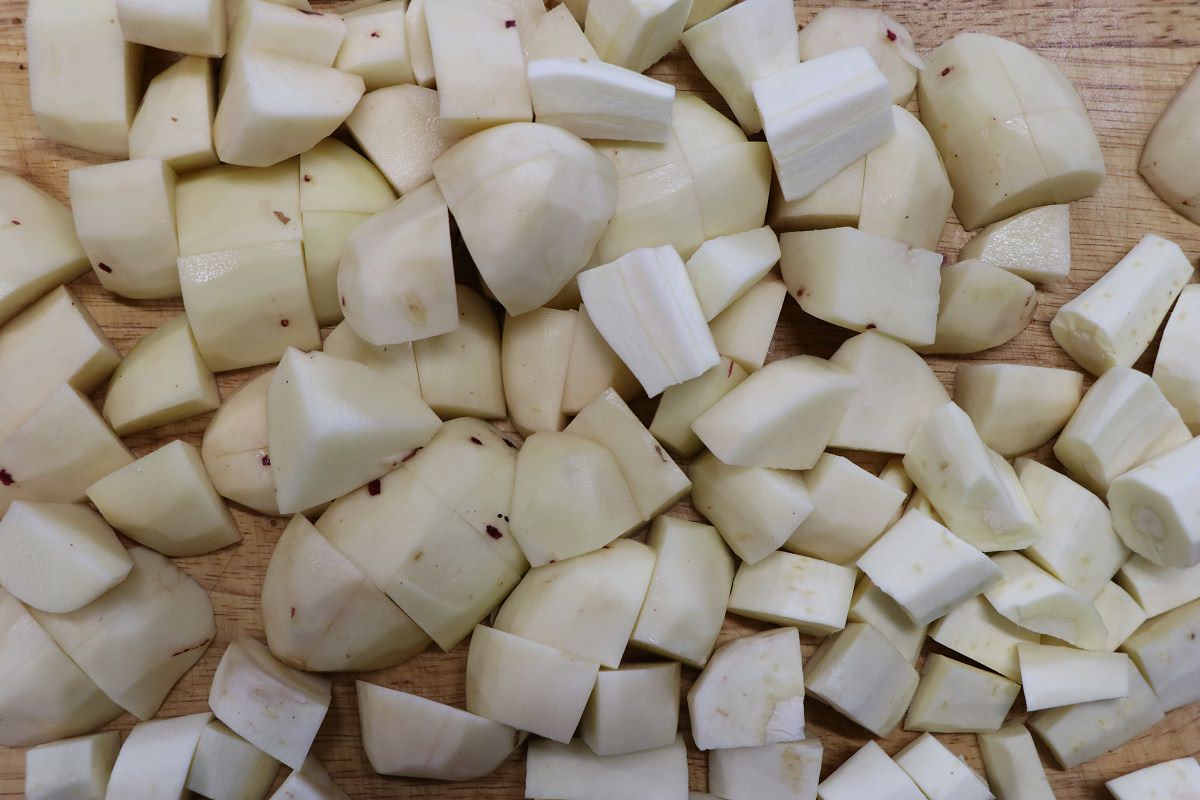 Chop potatoes and parsnips into cubes