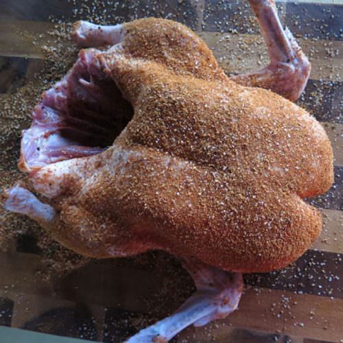 Season duck liberally inside cavity and all over the skin with Peking