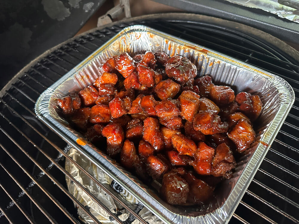 Cook pork belly cubes uncovered