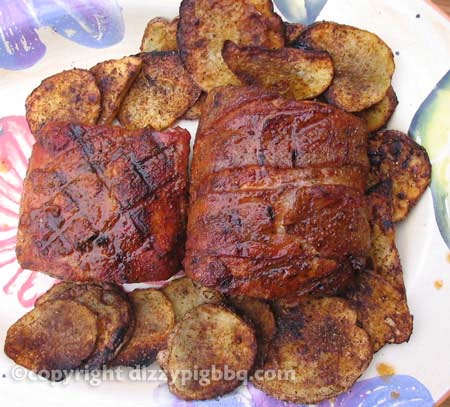 Serve golden brown potatoes slices with pork loin roast