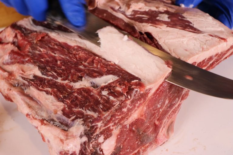 Trim fat and membranes from roast