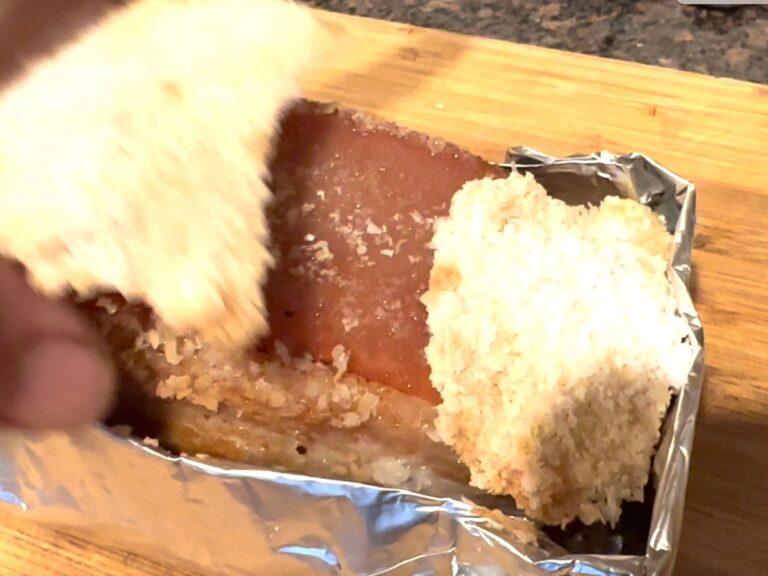 Remove meat from oven and remove salt crust