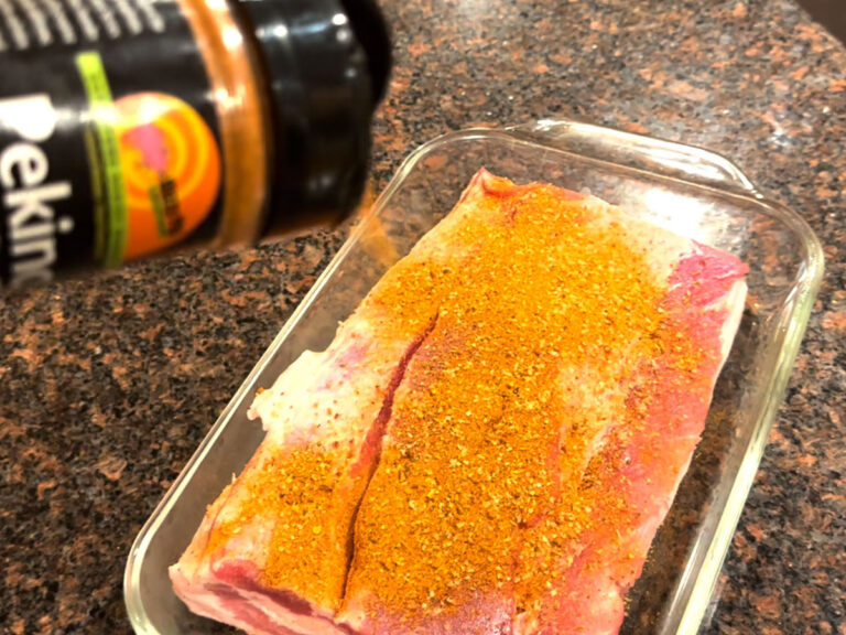 Season pork belly generously with Peking seasoning