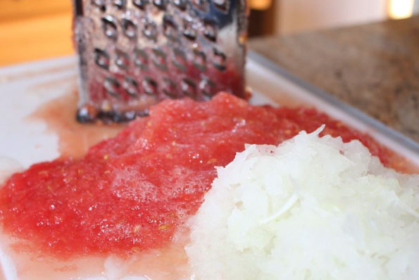 Grate both the tomato and onion with box grater