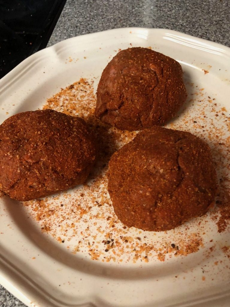 Season turkey mixture with Dizzy Dust and wrap around eggs