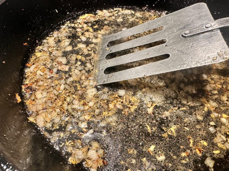 Simmer wine and chicken broth