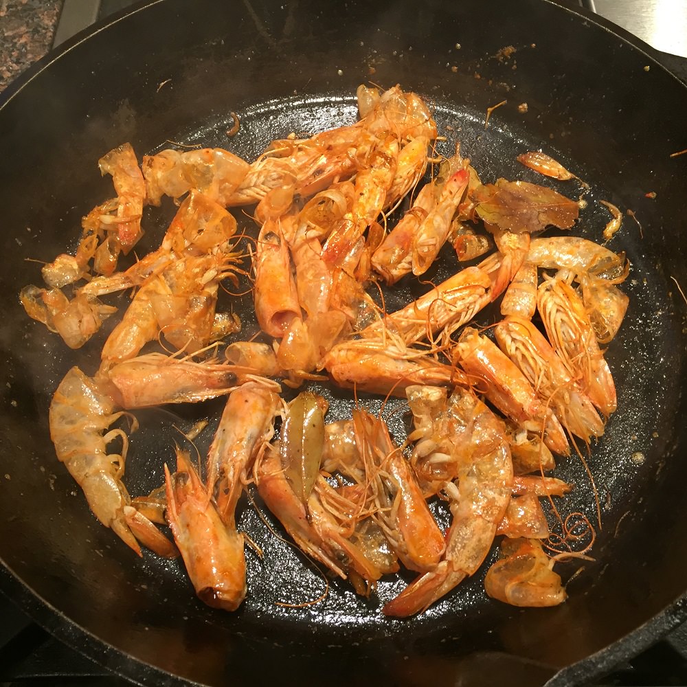 Saute shrimp heads and shells