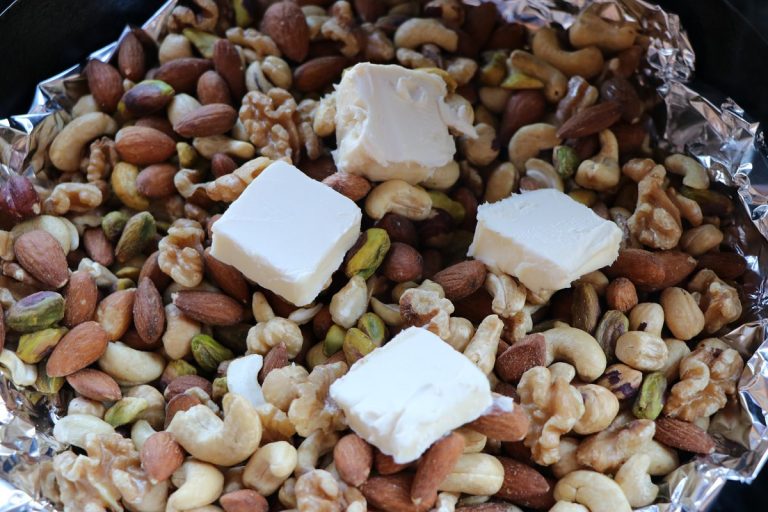 Coat nuts with butter