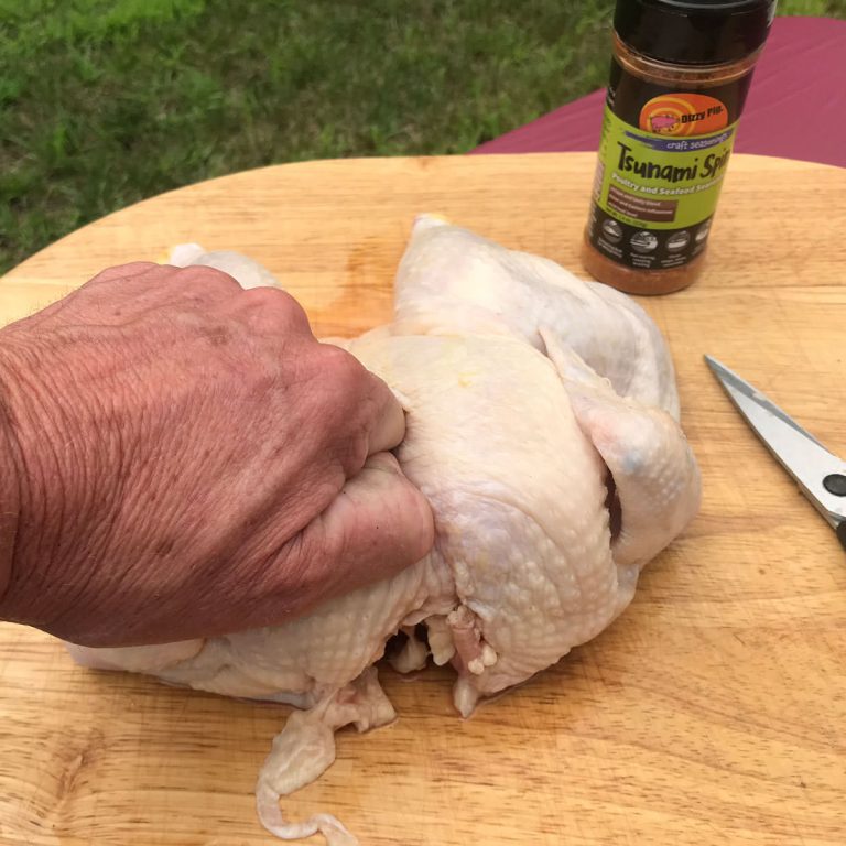 With the palm of your hand, press firmly on the top of the breast to flatten out