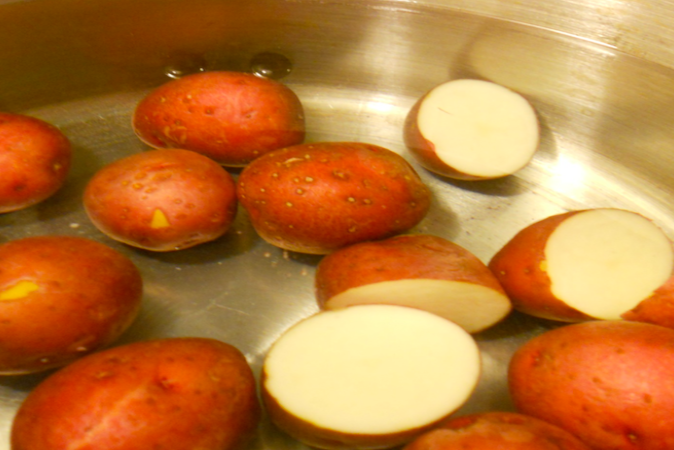 Boil potatoes in salted water
