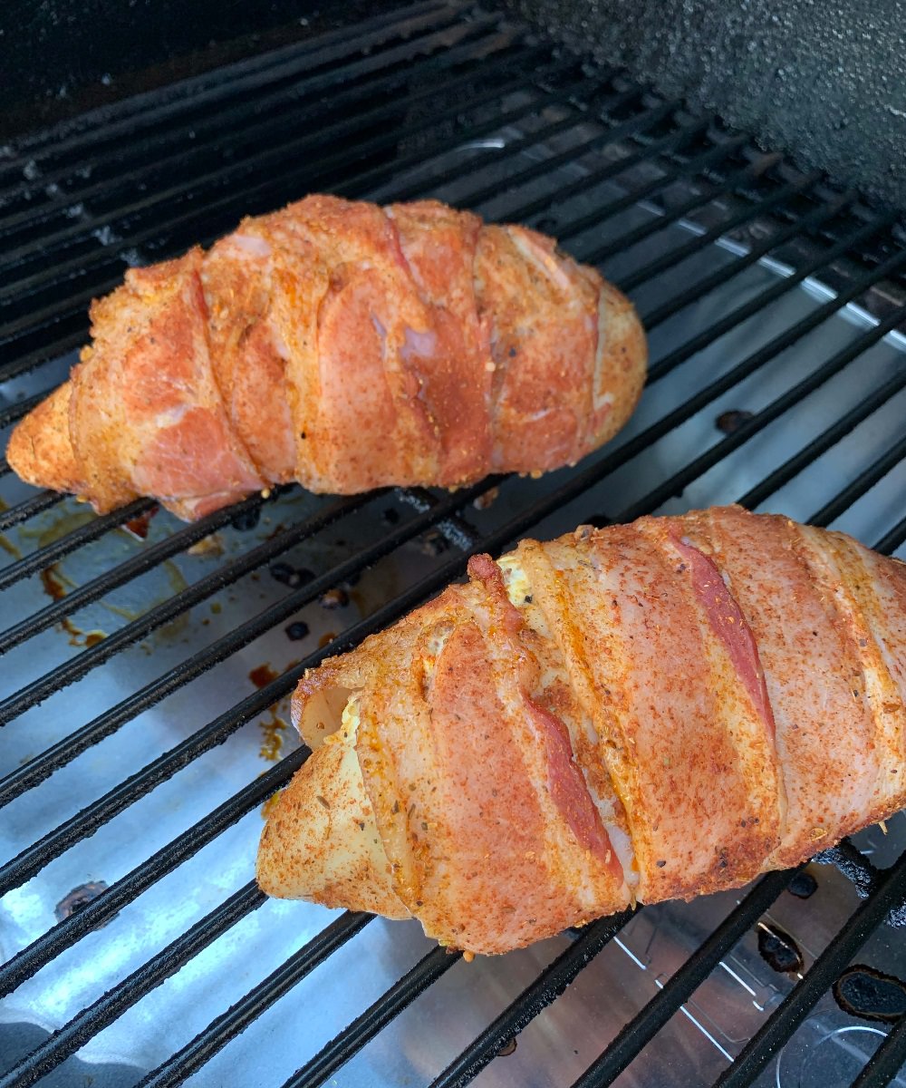 Place stuffed chicken breast in the smoker/oven