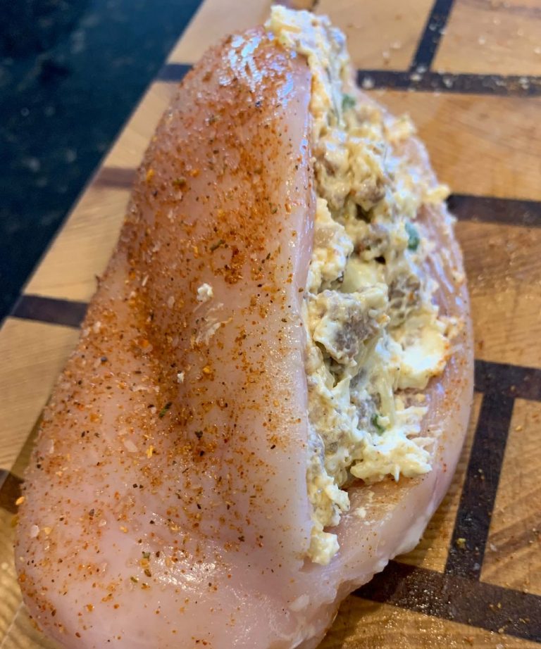 Stuff chicken breast and season with Raging River