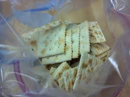 Empty the crackers into a resealable bag