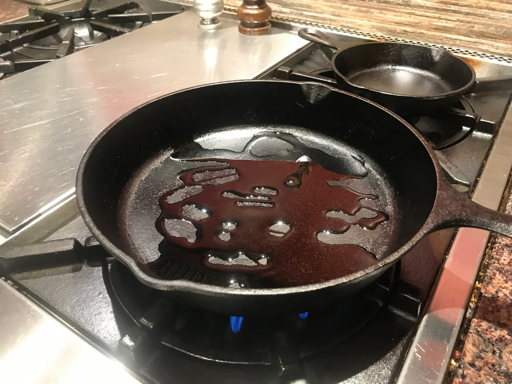 Add oil to a cast iron skillet over medium/high heat