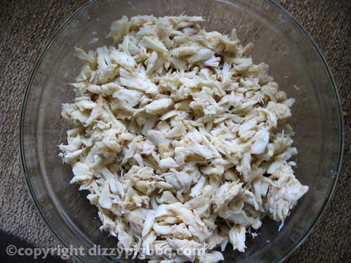 Remove shells from crabmeat