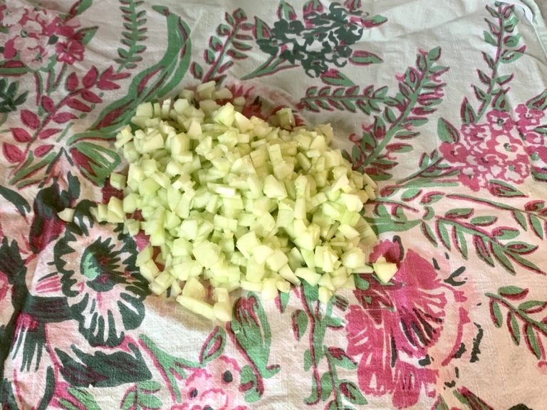 Wrap cucumber in dish cloth