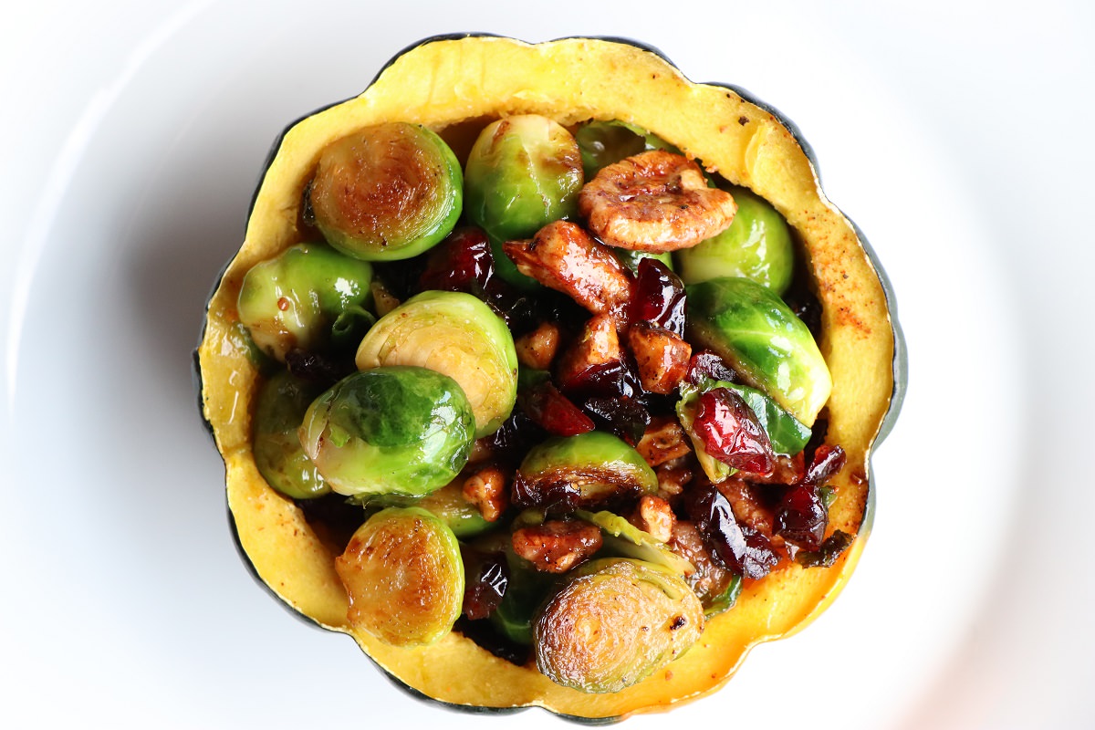 Fill each acorn squash half with the brussels sprouts mixture