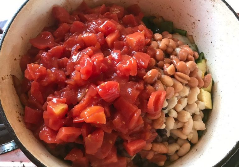 Add beans and tomatoes