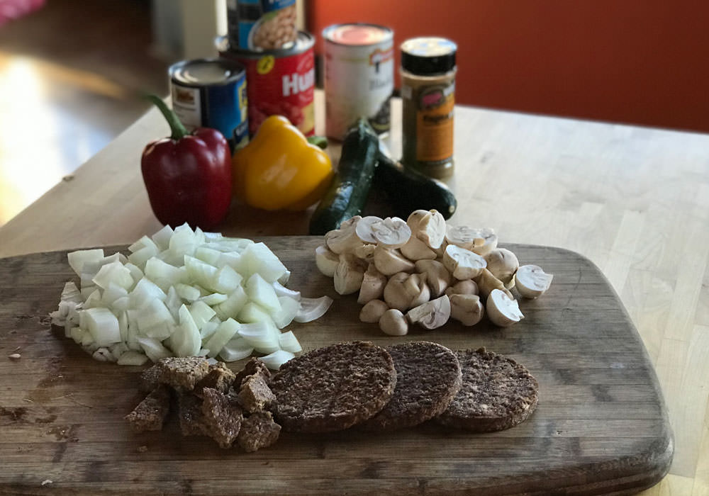 Chop the onions, veggie burgers and mushrooms into large pieces