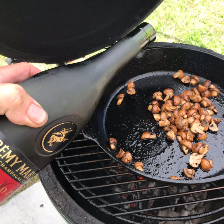 Add cognac to pan and reduce by half