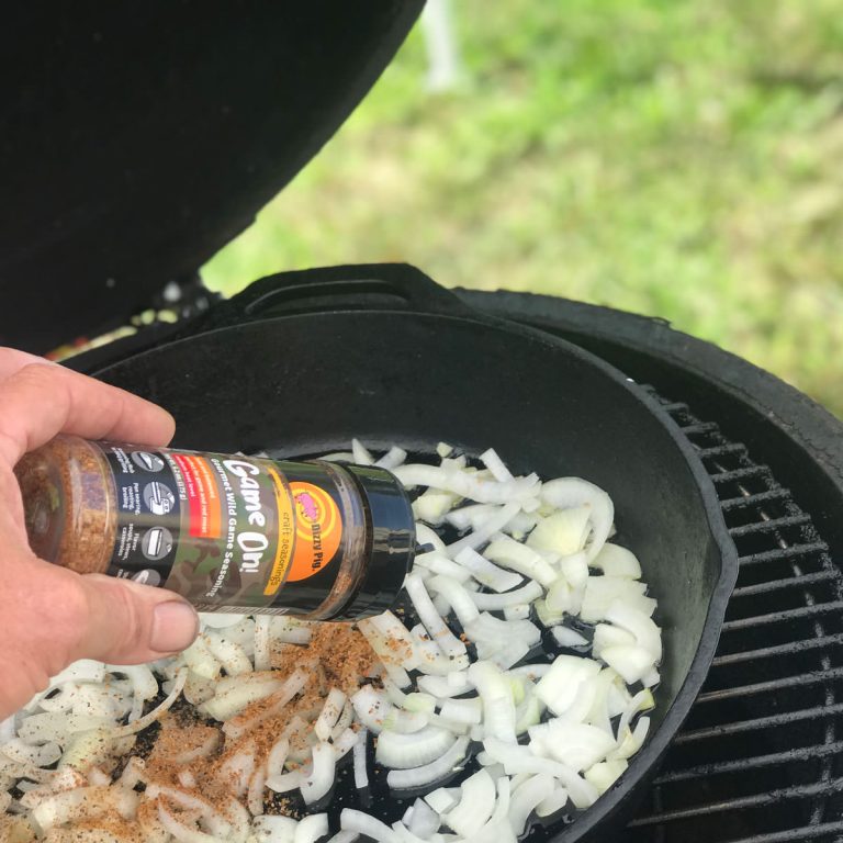 Add onions to pan and season lightly with Game On! seasoning