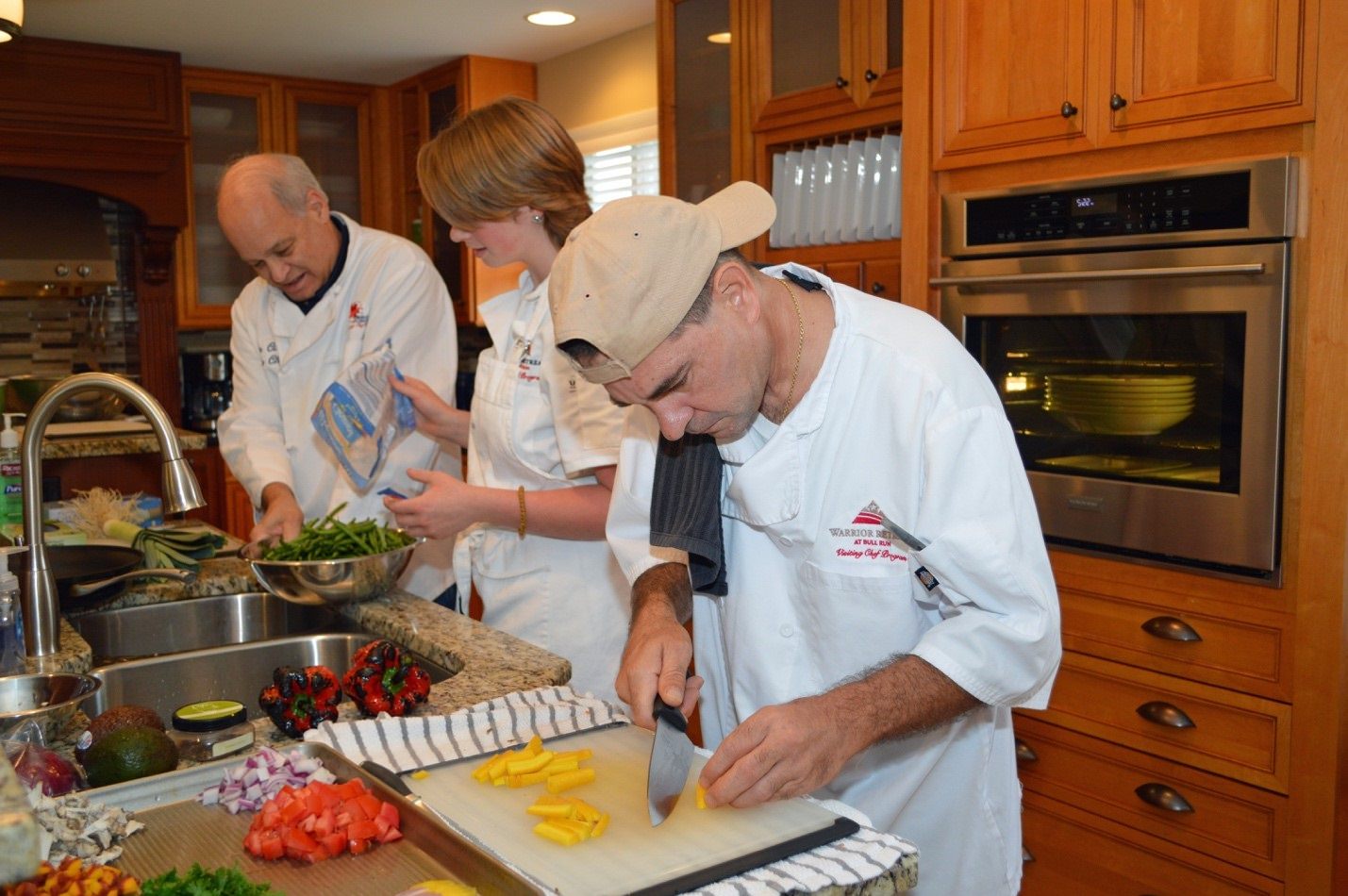 Guest Chefs working the kitchen at the Warrior Retreat.