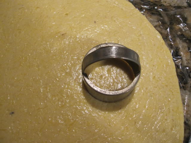Cut the dough into discs with a biscuit cutter